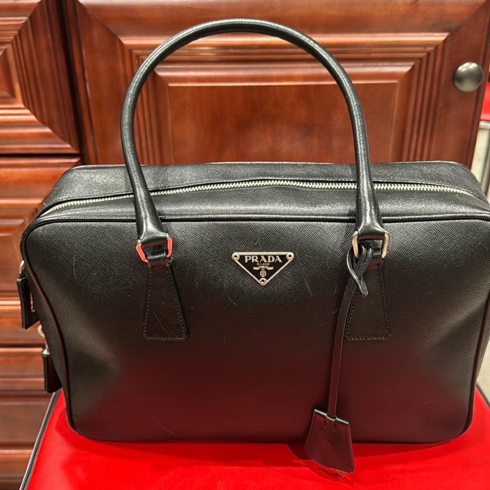 Preloved Luxury bag. Prada Saffiano sport. Used, but in perfect condition.